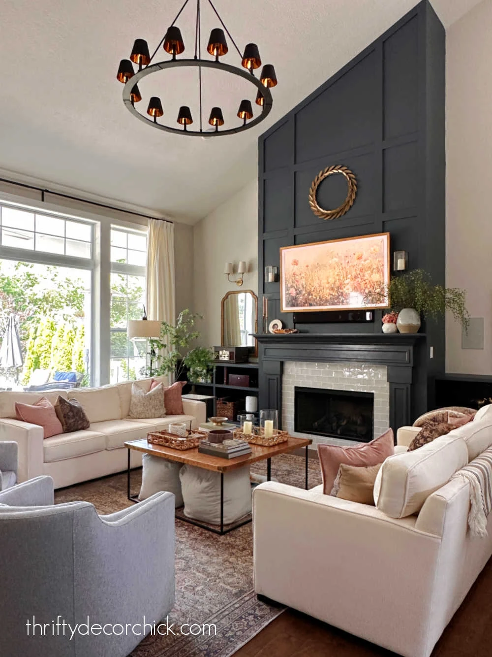 round chandelier with black gold shades